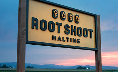 Root Shoot Malting Sign with sunset