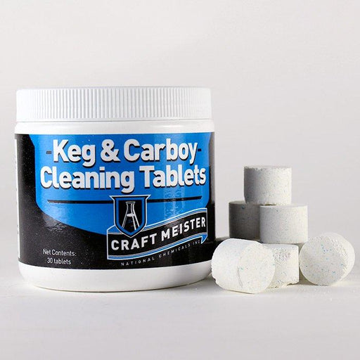 Craft Meister Keg & Carboy Tablet container, alongside a pile of stacked tablets