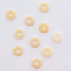 Ten Nylon Washers scattered about