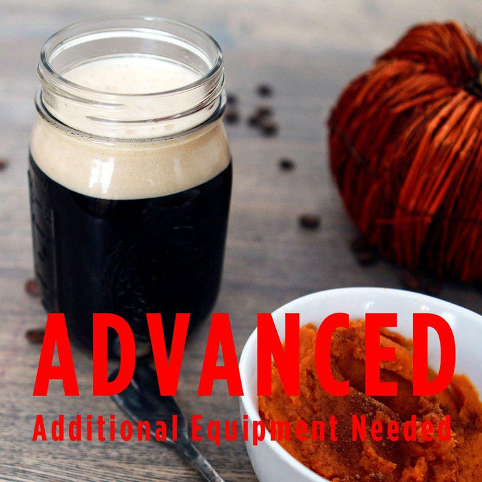 Pumpkin Spice Latte Stout in a mason jar beside a bowl of pumpkin and some pumpkin bread with a customer caution in red text: "Advanced, additional equipment needed" to brew this recipe kit