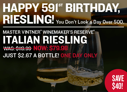 Advertisement for Italian Riesling wine with two glasses of wine and promotional text.