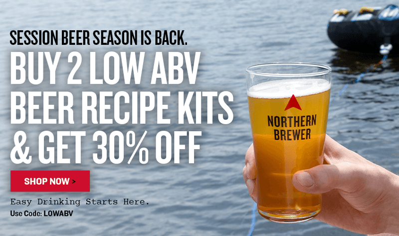 Promotional advertisement for Session Beer Season Is Back. Buy 2 or more Low ABV Kits and save 30% with code LOWABV Easy Drinking Starts Here. with a hand holding a glass of beer by a body of water.