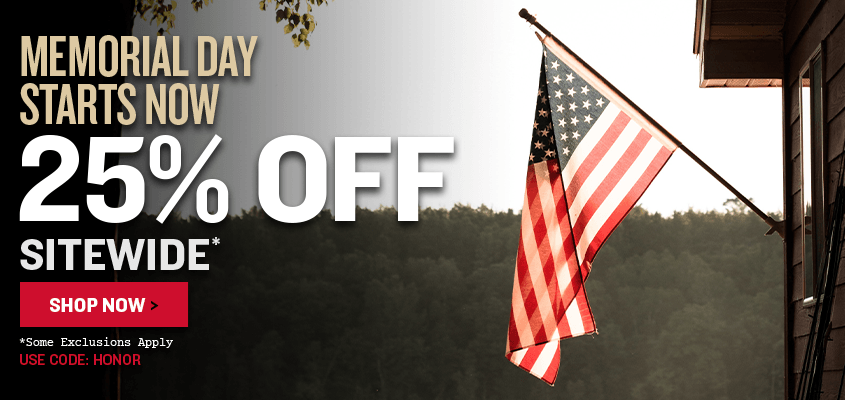Promotional banner with Memorial Day Starts Now text and American flag on a cabin by a woodsy lake, featuring a 25% off sitewide discount with code HONOR.