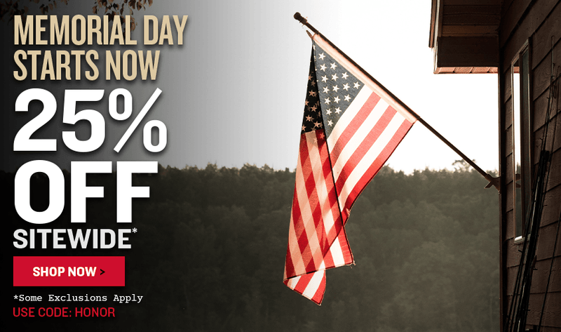 Promotional banner with Memorial Day Starts Now text and American flag on a cabin by a woodsy lake, featuring a 25% off sitewide discount with code HONOR.