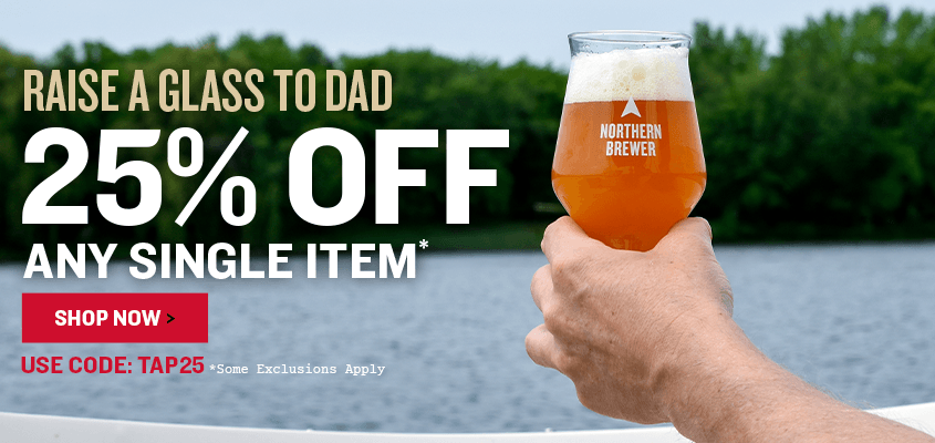 Hand holding a glass of beer in a boat on a lake in summer for a Raise a glass to dad 25% off any single item with code Tap25.