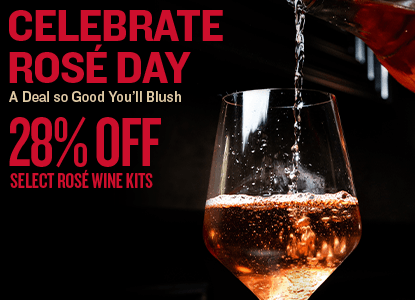 Promotional advertisement for rose wine kits with a glass of rose wine being poured, and text offering a 28% off select rose wine kits, Celebrate Rose Day a Deal so Good You'll Blush.