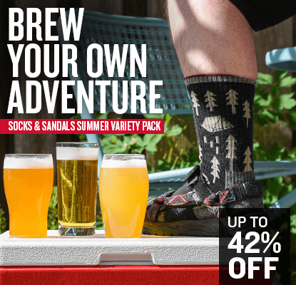 Promotional image with beer glasses and socks, featuring text 'Brew Your Own Adventure' and 'Socks & Sandals Summer Variety Pack' Up to 42% off.