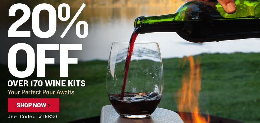 Wine being poured into a glass with a promotional text overlay for a wine kit sale. 20% off over 170 Wine Kits. Use code: WINE20