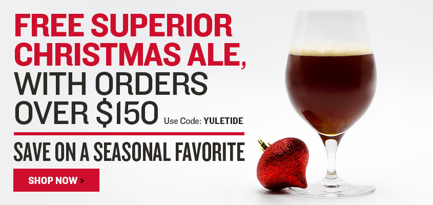 Promotional advertisement for free superior Christmas ale with orders over $150, featuring a glass of ale and a red berry on a white background.