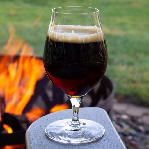 Glass filled with Sasquatch Barleywine on a white background