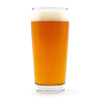 Glass of Cream Ale with a white background