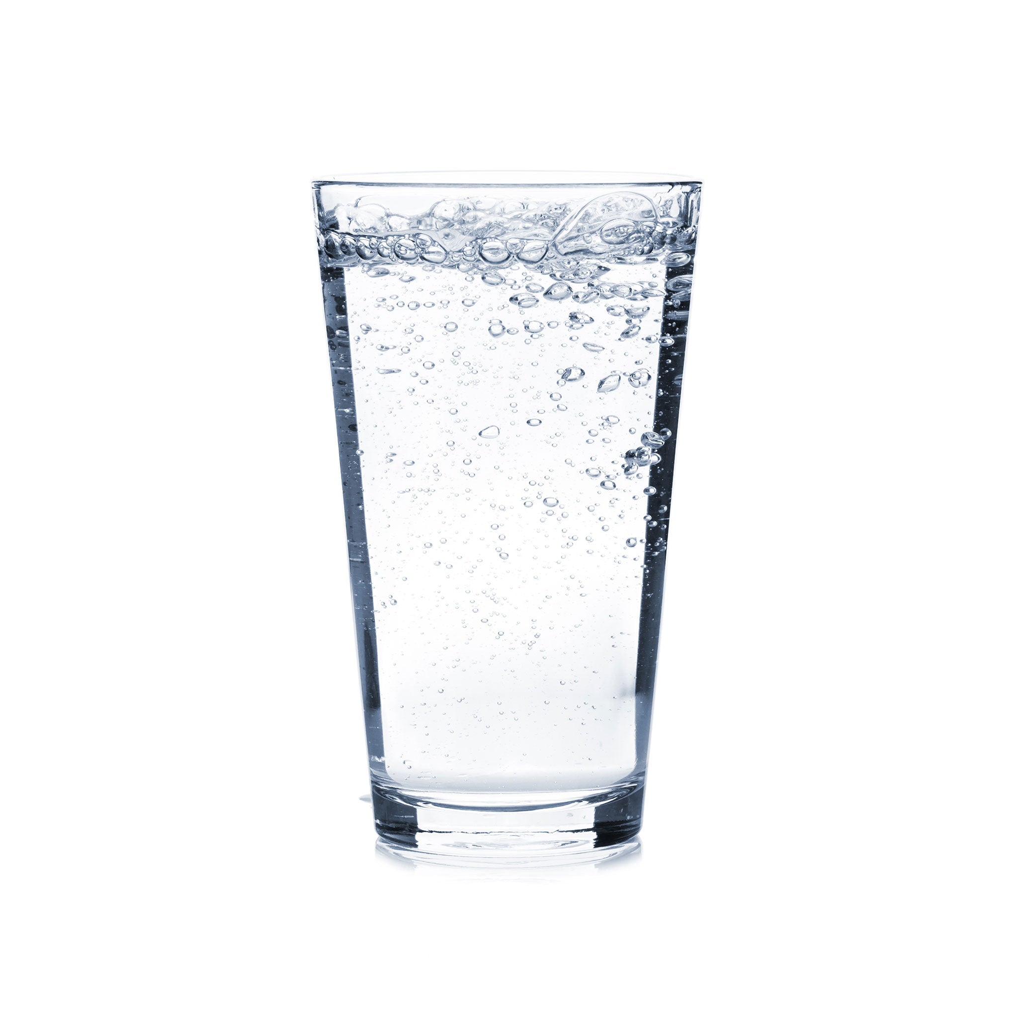 A glass full of Plain Hard Seltzer with ice and bubbles in the glass.