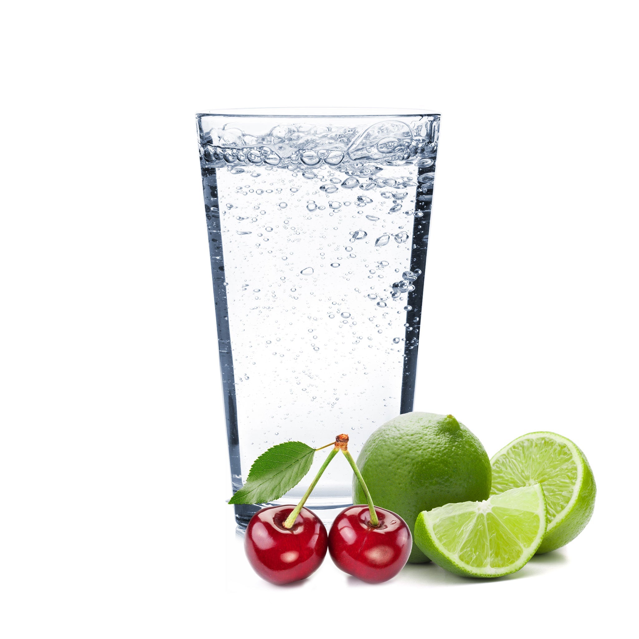 A glass full of Cherry Lime Hard Seltzer with cherries and lime wedges next to the glass.