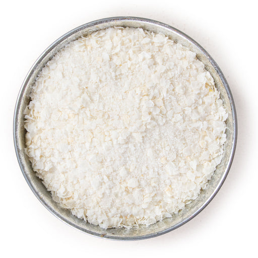 Pile of flaked torrefied rice in a small bowl.