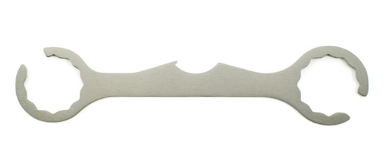 Metallic tool with a unique design on a white background