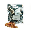 2-ounce bag of Grapefruit Peel with grapefruit peels in a pile