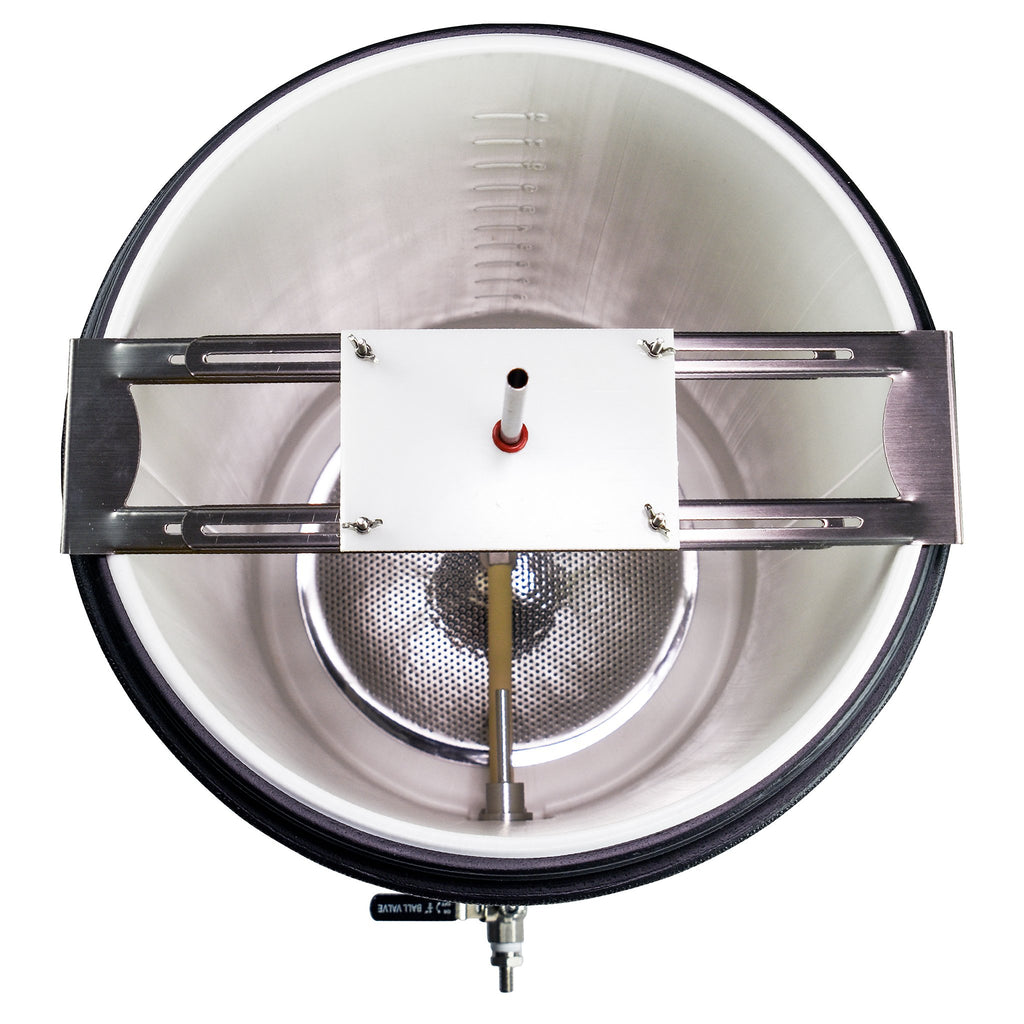 Top-down view into the mash tun, showing off the sparge arm