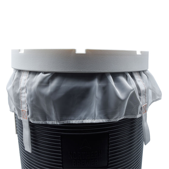 The reusable Brew Bag set in a mash tun with lid on