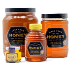 Group of Ames Farm Artisanal Minnesota Honey in various sizes.
