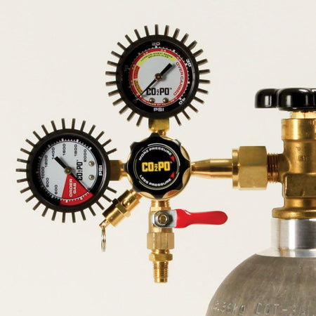 The co2po dual-gauge co2 regulator attached to a keg