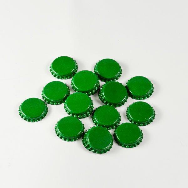 Small pile of green Crown Beer Bottle Caps