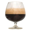 A glass half-filled with Peanut Butter Cup stout